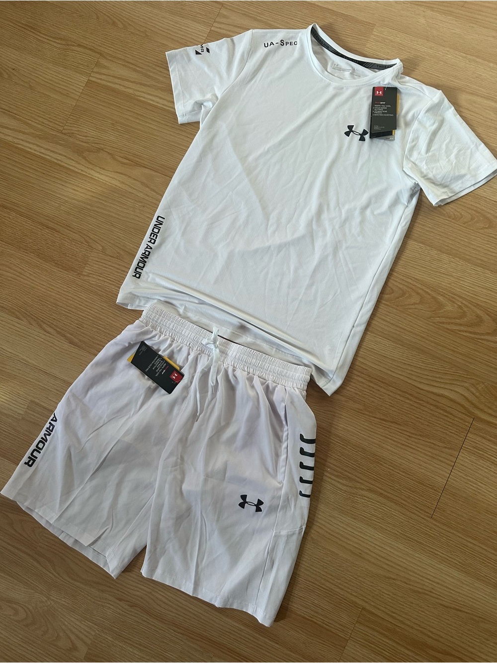 Under Armour Men’s White Athletic Shorts with Black Logo